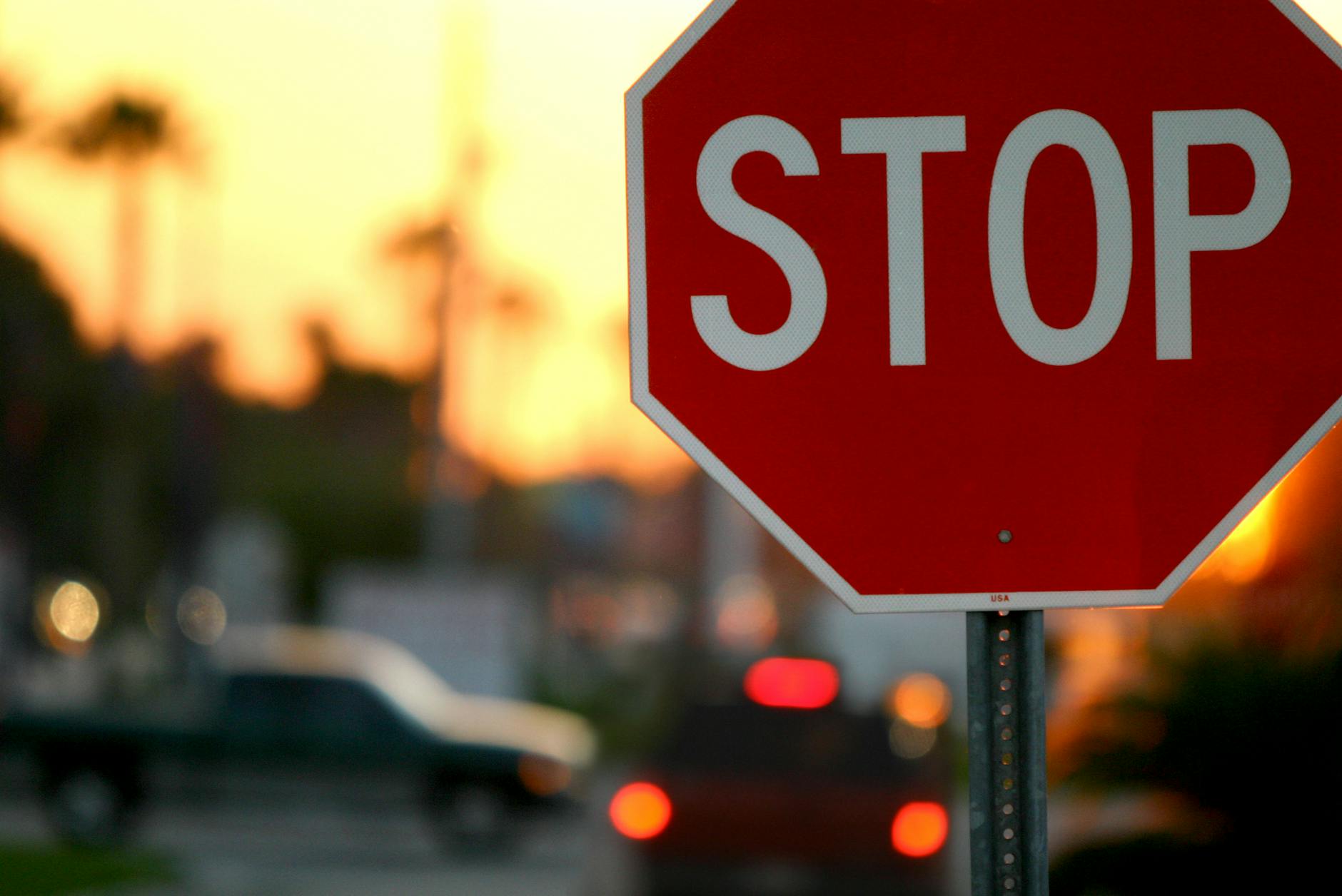 stop sign at sunset in kissimmee florida