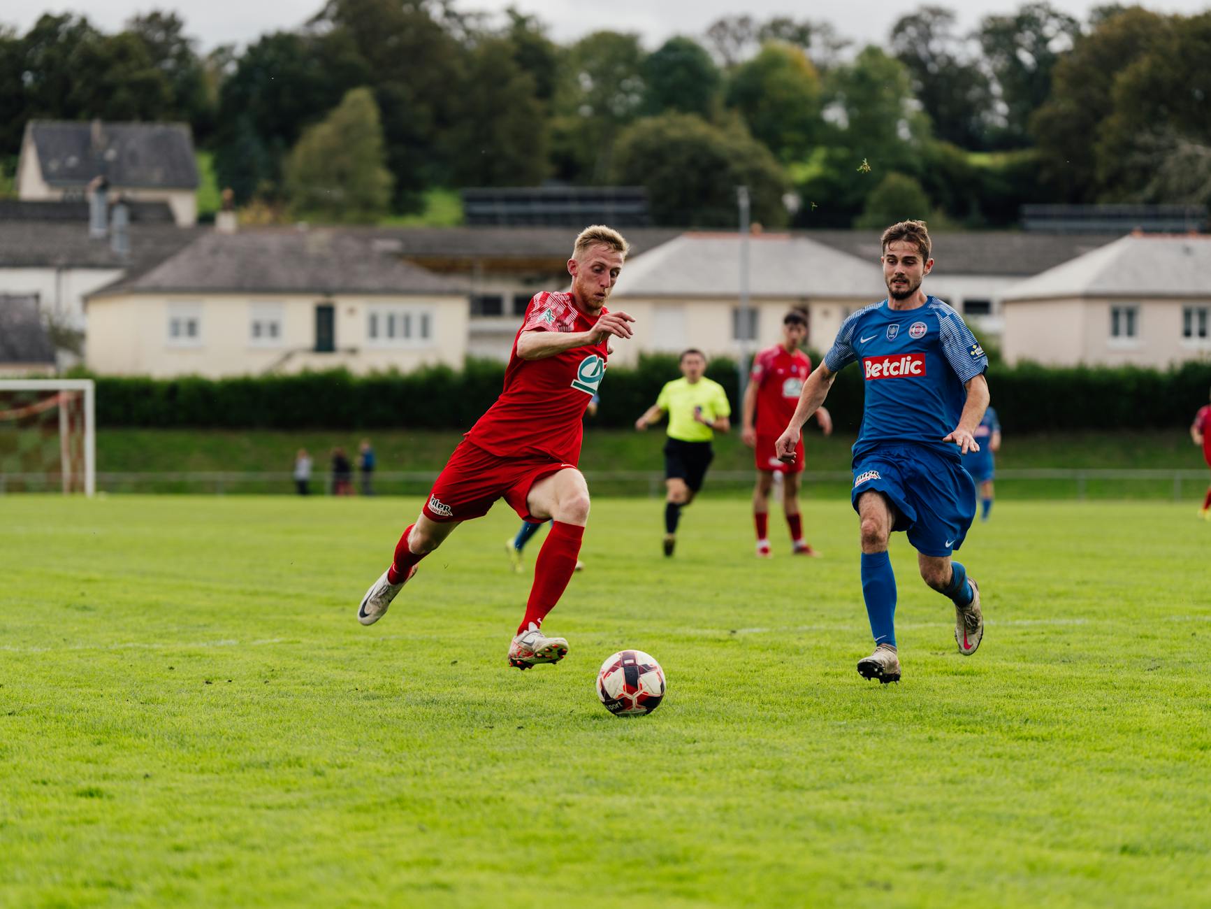 intense soccer match on green field
